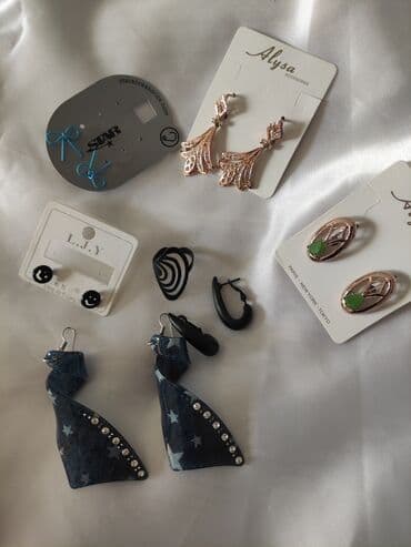 xari bulbul yaxa sancagi: Rəngi gedməyən sırğa — 11