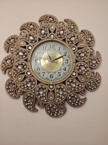 Divar saatları, Elektron, Saniyə əqrəbi