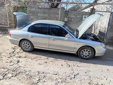 suktur: Hyundai Elantra (J3) sedan, gümüşü rəng. - Kuzov: 4 qapılı sedan — 4
