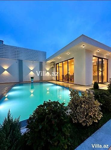 ucuz heyet evler: Müasir tərzdə inşa edilmiş bir mərtəbəli villa. Geniş şüşə sürgülü — 1