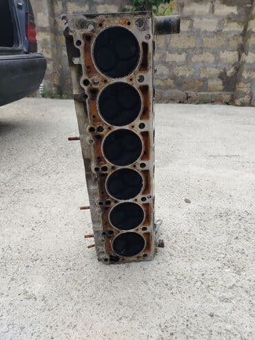 mercedesbenz w210 surətlər qutusu başlığı: Blok başlığı, avtomobil mühərrikinin vacib bir hissəsidir. Silindrləri — 4