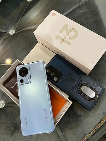 redmi note 14 ikinci el: Xiaomi 13 Lite, rəng - Mavi, 
 Barmaq izi — 1