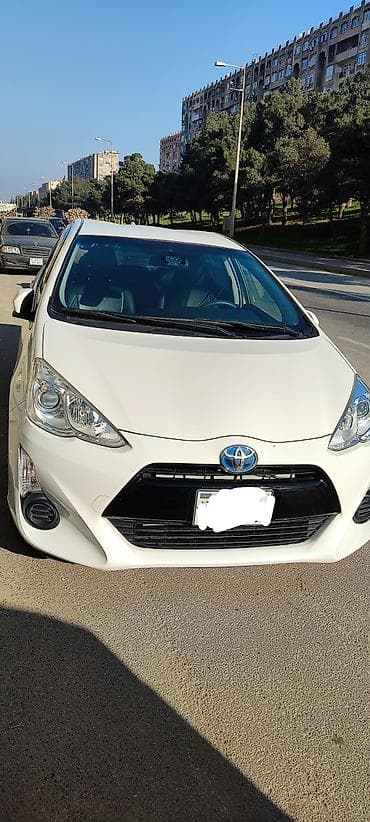 Водный транспорт: Toyota Aqua Hybrid hatchback - Kuzov: 5 qapılı kompakt hatchback - — 2