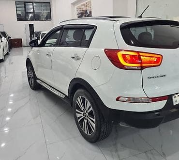 kia mini: Kia Sportage: 2 l | 2014 il — 2