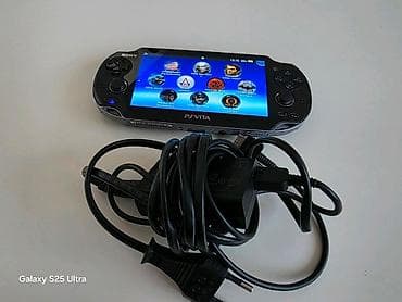 ps4 2 orjinal pult: Playstation vita ela veziyyetdedir Hec bir problemi yoxdu Ciziqsizdir — 1