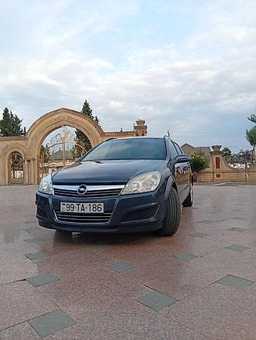 winda teker evi: Opel Astra H Caravan (universal kuzov) - Kuzov: universal, 5 qapı - — 2