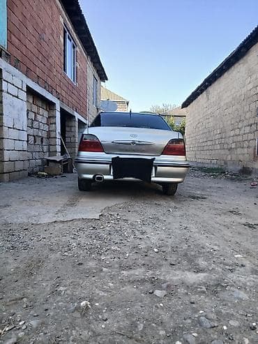 panel vurmaq: Daewoo Nexia sedan – gümüşü rəng Xüsusiyyətlər: - Kuzov: 4 qapılı — 4