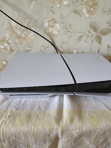 Nintendo Switch: PlayStation 5 + pult + oyun Paketə daxildir: - PS5 konsolu (disk — 1