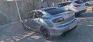teker 215 65 16: Mazda 323: 2.3 l | 2004 il Sedan — 3