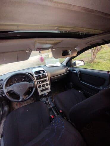 nissan note motor: Opel Astra: 1.6 l | 1999 il Sedan — 12