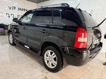 bmw e39: Hyundai Tucson: 2 l | 2007 il — 3