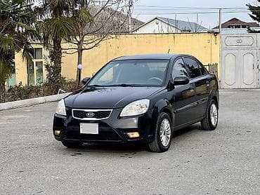опель зафира а: Kia Rio: 1.4 л | 2011 г. Седан — 7