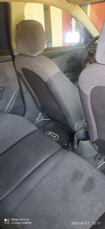 последующий выкуп авто бишкеке: Qara rəngdə olan Kia Rio avtomobili. Bu model şəhər daxilində rahat — 15