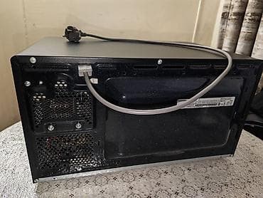 del: Az islenmis Samsung mikrodalğalı soba Qara rəngli, ön hissəsi güzgü — 4