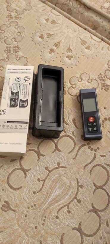 lazer ölçüm cihazı: Lazer Metre Material**: Akrilonitril Butadien Stirol (ABS) 2 — 2