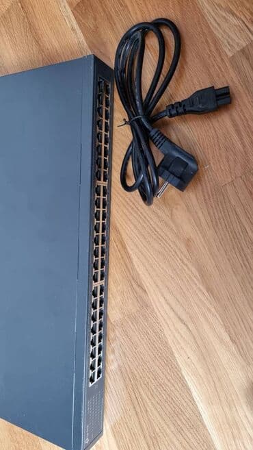 modemlerin qiymeti: Yeni kimidir.Az işlənilib.48port 100mbs switchdir. Bütün portlar — 3