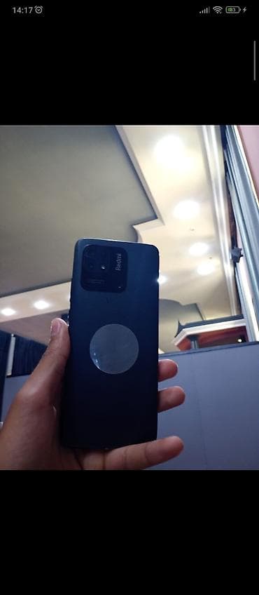 on kamera: Redmi smartfon - Arxa tərəfdə “Redmi” loqolu çoxkameralı modul — 1