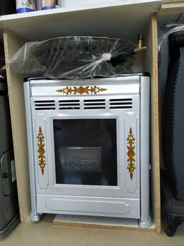 буржуйка для дома: Qaz sobası/isitmə sobası - Gümüş rəngli metal korpus, qızılı dekor — 1