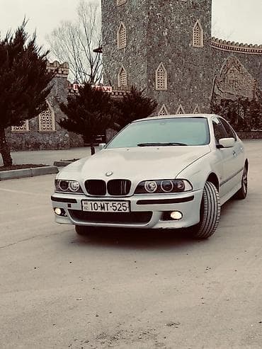 on panel: BMW 5 Series E39 sedan - Kuzov: gümüşü rəng, 4 qapı - Faralar: “angel — 10