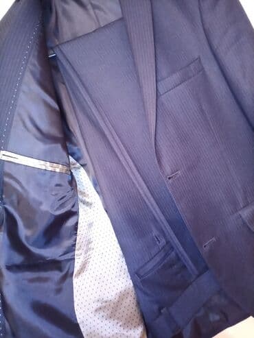 göy rəngli kişi cemperləri: Türkiyə istehsalı Kişi kastyum şalvarı. Razmer : 50.Rəng Tünd göy — 4