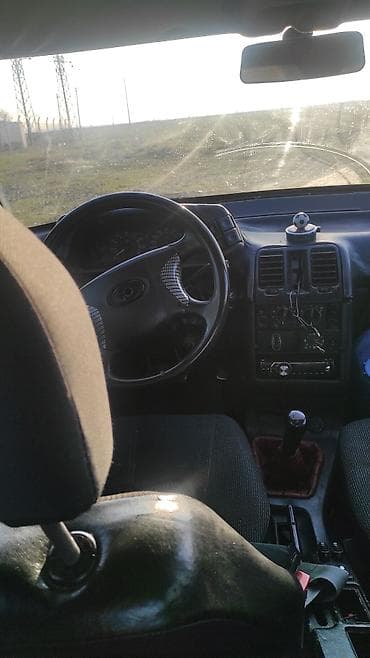 Motonəqliyyat: Avtomobil: Lada 2110 sedan Əsas xüsusiyyətlər: - Kuzov: 4 qapılı — 1