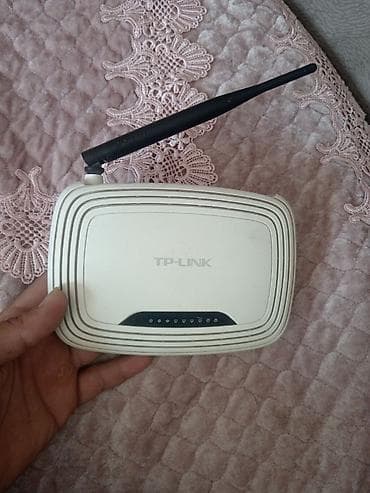 iphone 7 pro: TP-Link Wi‑Fi router — 1