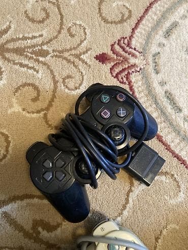 plesdeyşin 2: Sony PlayStation 2 Slim (PS2) oyun konsolu Xüsusiyyətlər: - Model — 2