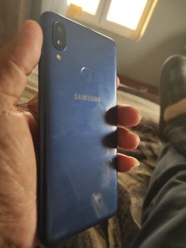 komputer korpusu: Samsung A10e, rəng - Mavi, Barmaq izi — 2