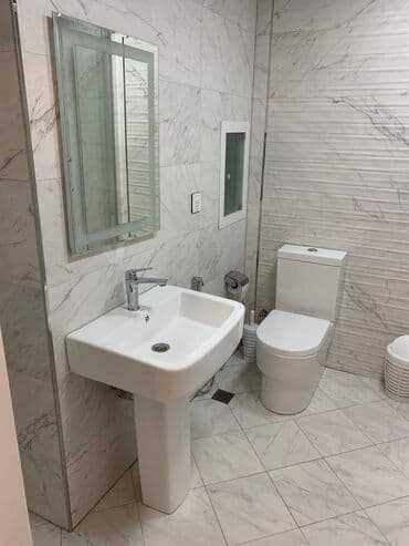 qarayev obyekt: Qaraev metrosuna 18 mertebeli binanın 7-ci mərtəbəsində yerləşən — 18