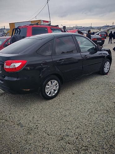 opel astra hecbek 2000: VAZ (LADA) Granta: 1.6 l | 2021 il 316350 km Sedan — 3