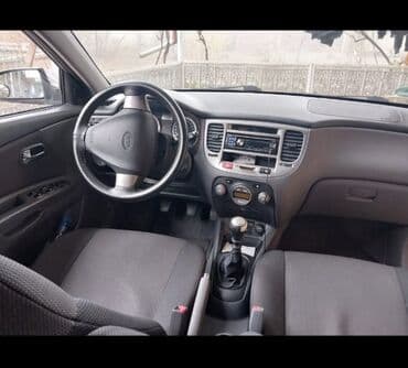 Математика: Model: Kia Rio (sedan), gümüşü rəng Kuzov: 4 qapı, aerodinamik — 1