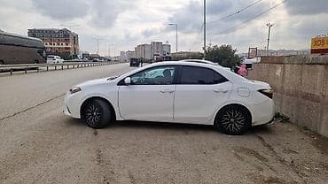 Toyota Corolla, ağ rəng,sedan gövdə. I - Nömrə nişanı: 99-KY-573 — 4