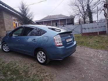 ilkin odənişsiz avtomobil: Toyota Prius, mavi rəng, 5 qapılı hatchback, hibrid. - Yüngül lehimli — 9