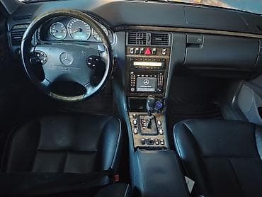 bmw 330 i: Mercedes-Benz E 320: 3.2 l | Sedan — 3