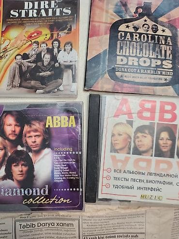mini disk: Musiqi CD/DVD diskləri toplusu Janr və ifaçılar: - Rock və pop: Dire — 1
