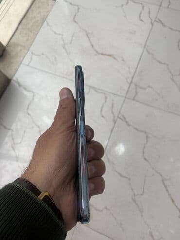 ucuz plansetler qiymeti: TCL T676Hsmartfon - Rəng: açıq mavi arxa panel, mat tekstura, metal — 5