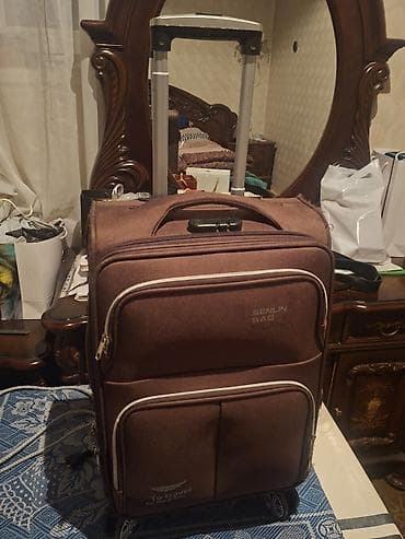 Şəkildə gördüyünüz qəhvəyi rəngdə çamadanı satıram. 20 kiloya qədər — 2