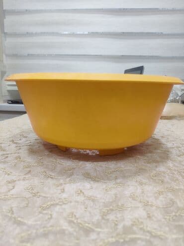 Məhsul: Sarı rəngli plastik süzgəcli leğən Təsvir: - Mərkəzdə dairəvi