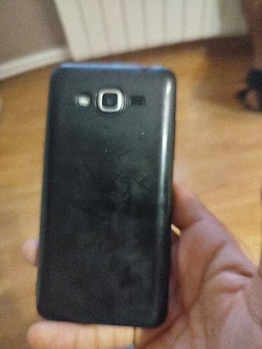ipone 13 sade: Samsung J210, rəng - Qara, Qırıq — 1