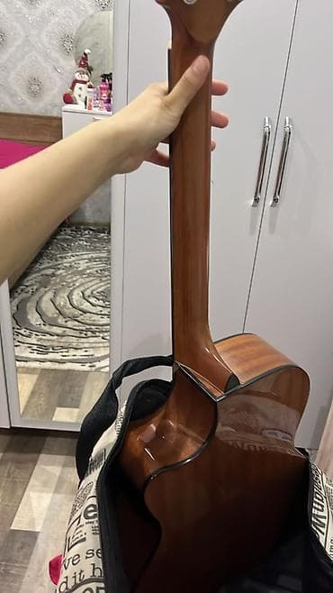 Real aliciya cuzi endirim eliyerem. Gitara xususi zakaz ile