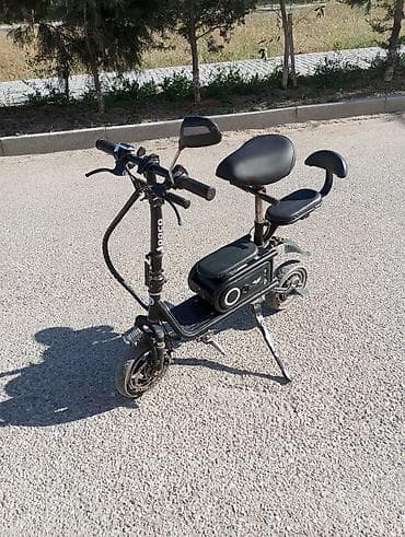 e39 guzgu: Elektrikli skuter. 10 Ah. Tam doldurma ilə 20-25 km. Sürət təxminən 20 — 3
