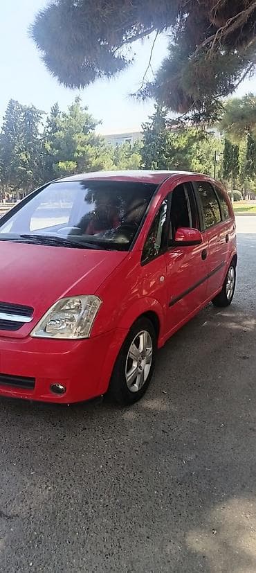 nissan note mini: Opel Meriva, qırmızı rəngli, şəhər və ailə istifadəsi üçün rahat — 4