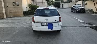 audi a6 2000: Opel Astra Caravan (Universal) – ağ rəngdə, ECOTEC mühərrikli — 4