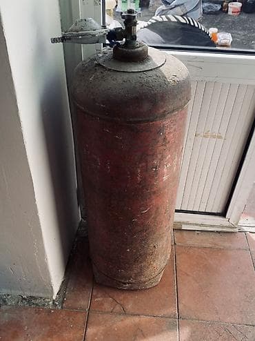 azeri panel vurmaq: Məhsul: Maye qaz (LPG) balonu Təsvir: - Klassik silindrik metal LPG — 1