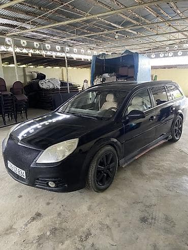 xırdalan heyet evi kiraye: Qara rəngli universal opel vektra(station wagon) avtomobil Yaxsi — 2
