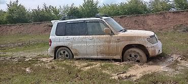 Nəqliyyat: Mitsubishi Pajero: 1.8 l | 1999 il 30000 km Sedan — 2