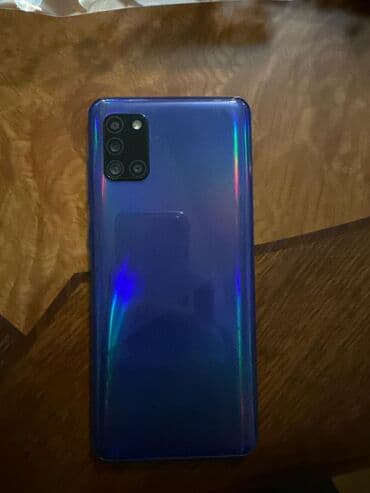 Apple iPhone: Samsung Galaxy A31, цвет - Голубой, Отпечаток пальца — 1