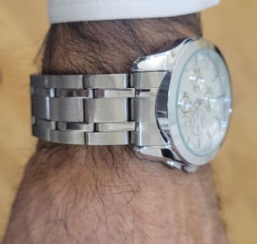 oğlan sepləri: İşlənmiş, Qol saatı, Tissot, rəng - Gümüşü — 9