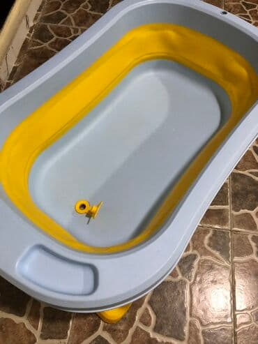 Uşaq arabaları: Uşaq vannası – qatlanan model - Rəng: açıq mavi və sarı - Material — 1