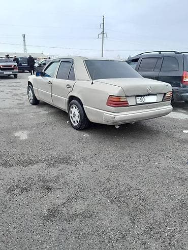 mersedes disk: Mercedes-Benz E 200: 2 l | 1991 il Sedan — 5